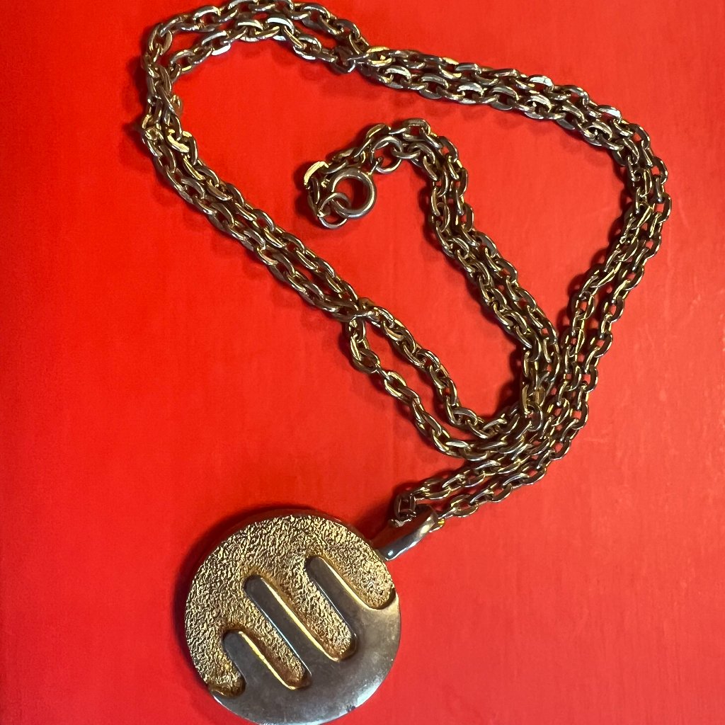 Vintage Kramer Classic Gold-Tone Necklace With Round Abstract Design Pendant